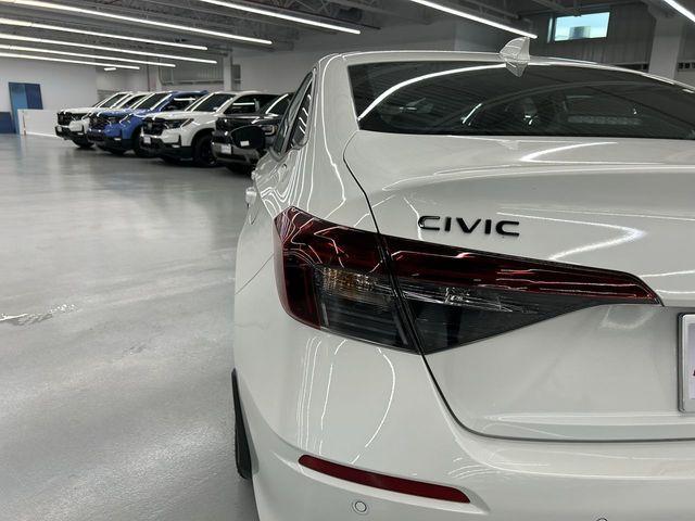 Photo of 2026 Platinum White Pearl Honda Civic Hybrid