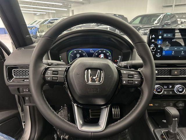 Photo of 2026 Platinum White Pearl Honda Civic Hybrid