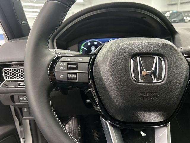 Photo of 2026 Platinum White Pearl Honda Civic Hybrid