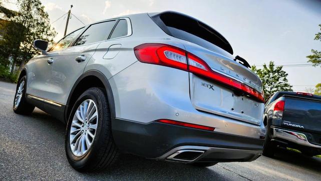 Photo of 2016 Ingot Silver Metallic Lincoln MKX