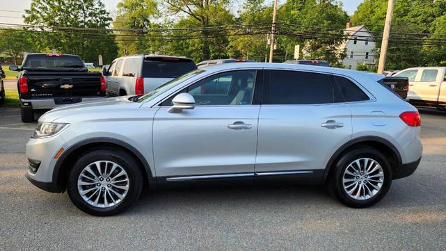Photo of 2016 Ingot Silver Metallic Lincoln MKX