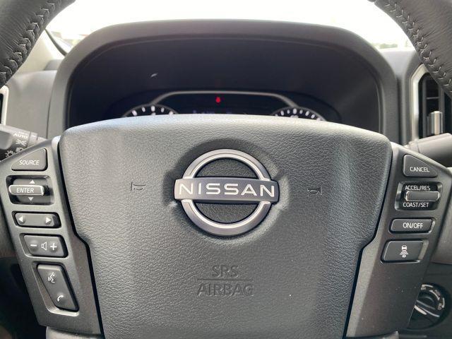 Photo of 2025 Glacier White Nissan Frontier