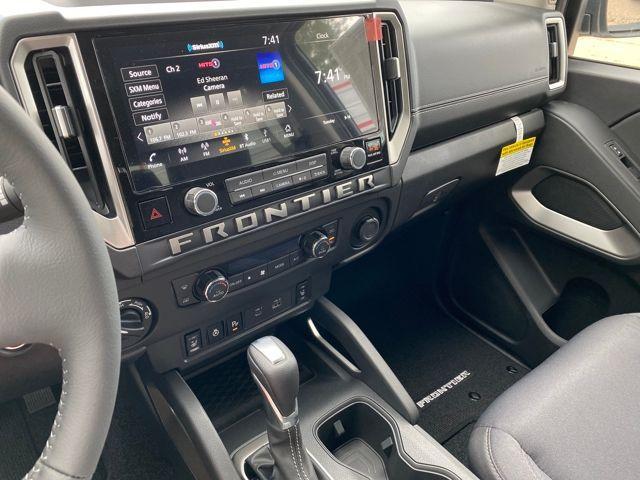 Photo of 2025 Glacier White Nissan Frontier