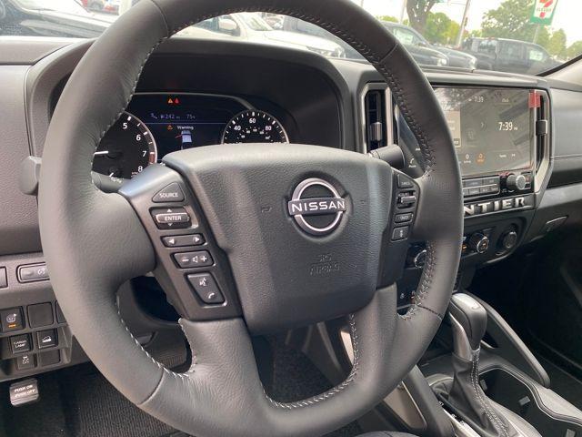 Photo of 2025 Glacier White Nissan Frontier