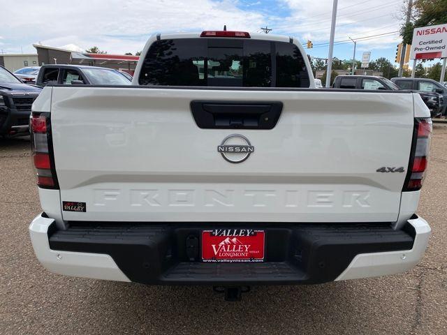 Photo of 2025 Glacier White Nissan Frontier
