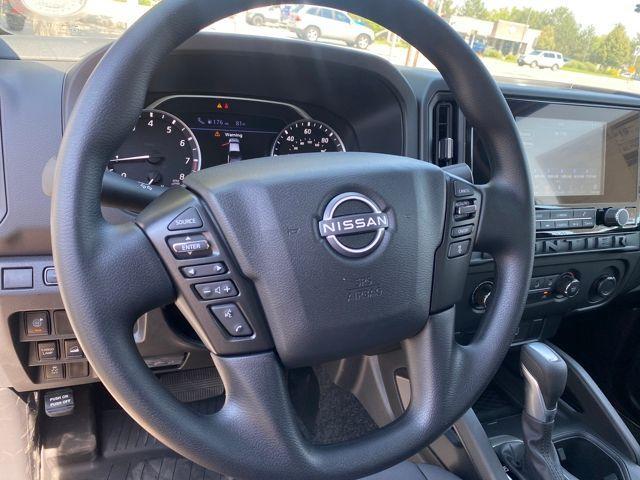 Photo of 2025 Glacier White Nissan Frontier