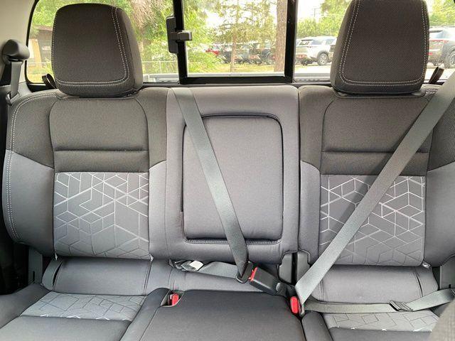 Photo of 2025 Glacier White Nissan Frontier