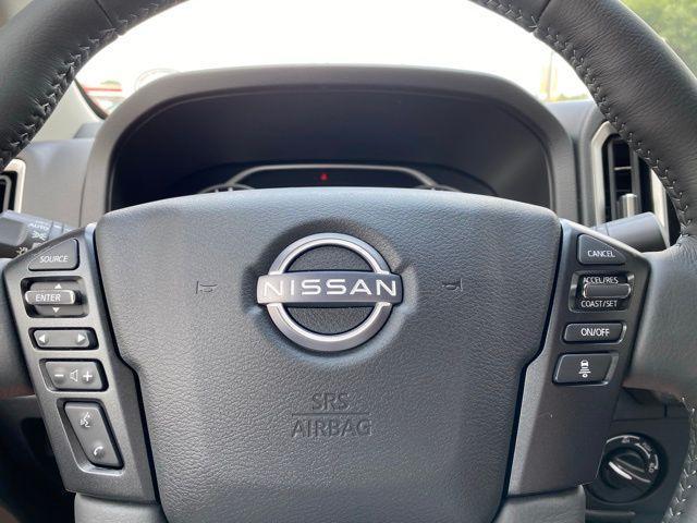 Photo of 2025 Glacier White Nissan Frontier