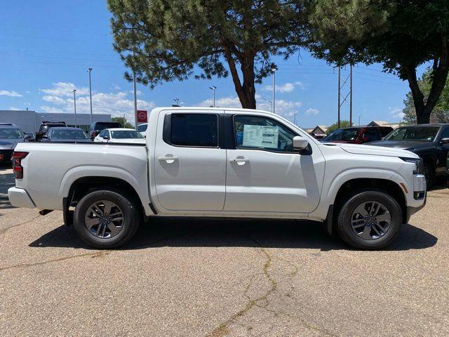 Photo of 2025 Glacier White Nissan Frontier