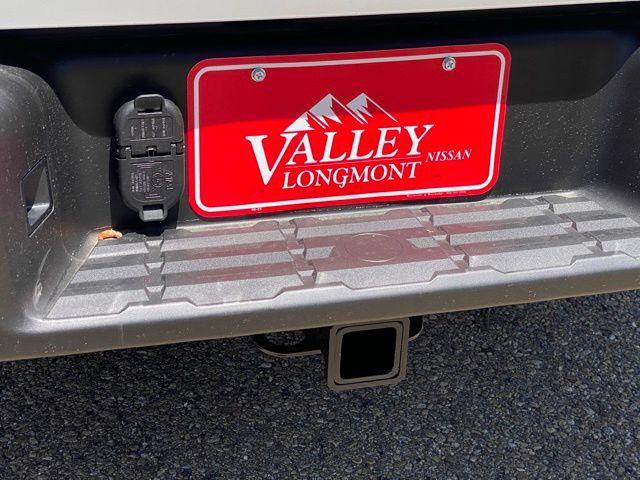 Photo of 2025 Glacier White Nissan Frontier