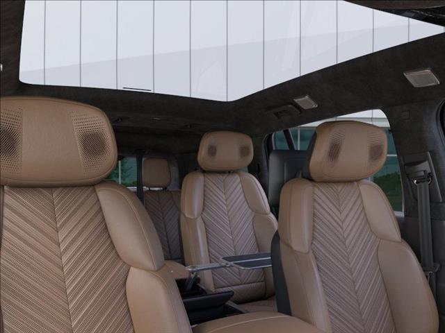 Photo of 2026 Vibrant White Tricoat Cadillac Escalade IQ