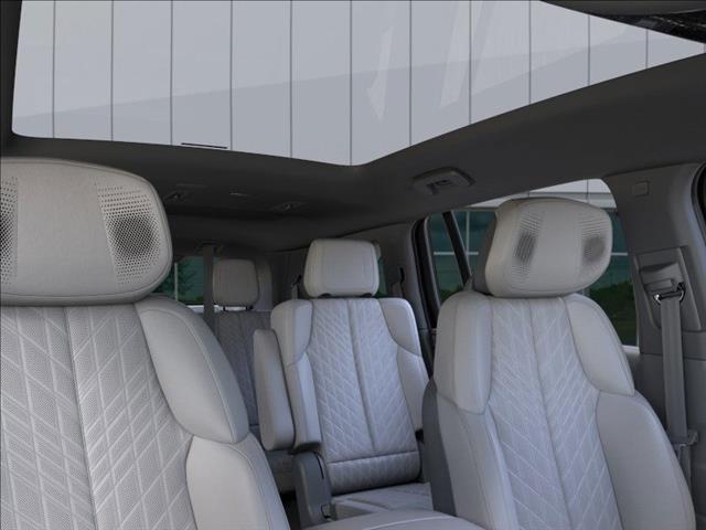 Photo of 2025 Black Raven Cadillac Escalade IQ