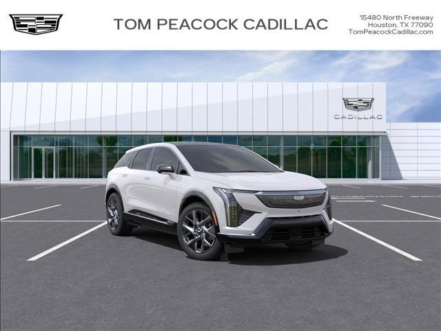 Photo of 2025 Crystal White Tricoat Cadillac OPTIQ