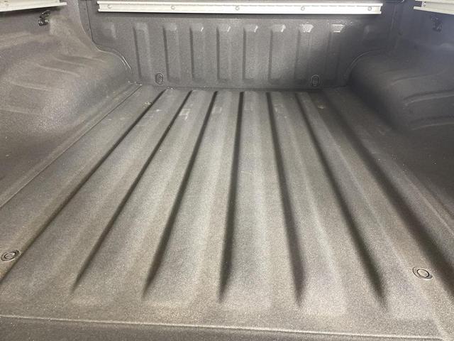 Photo of 2025 Glacier White Nissan Frontier