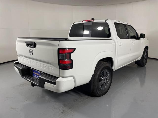 Photo of 2025 Glacier White Nissan Frontier