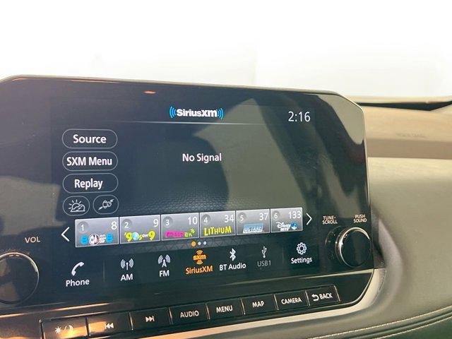 Photo of 2023 Scarlet Ember Tintcoat Nissan Rogue