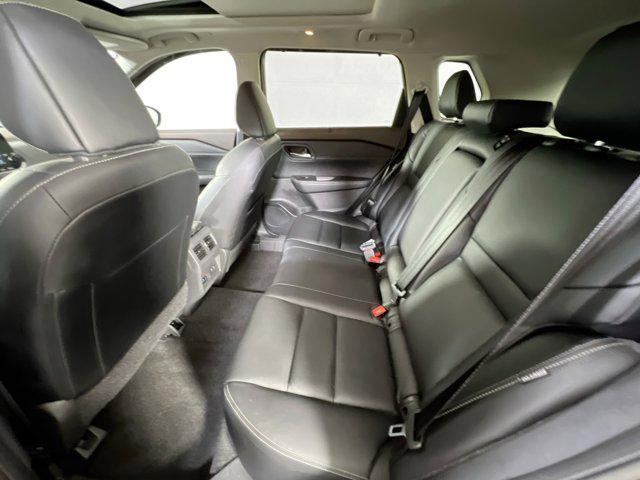 Photo of 2023 Scarlet Ember Tintcoat Nissan Rogue