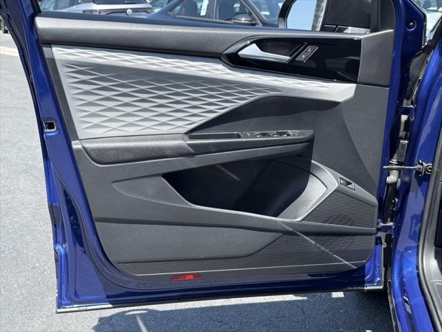 Photo of 2023 Dusk Blue Metallic Volkswagen Taos