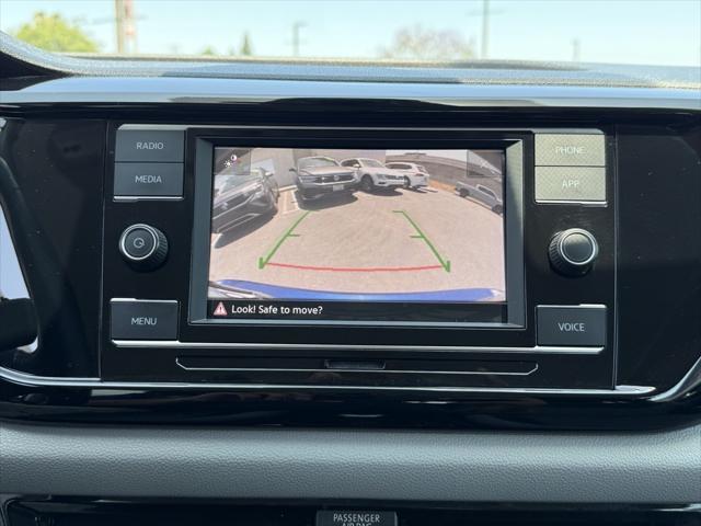 Photo of 2023 Dusk Blue Metallic Volkswagen Taos