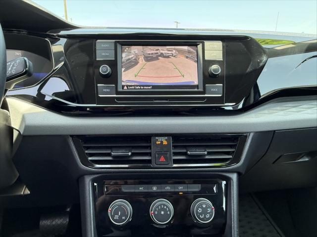 Photo of 2023 Dusk Blue Metallic Volkswagen Taos