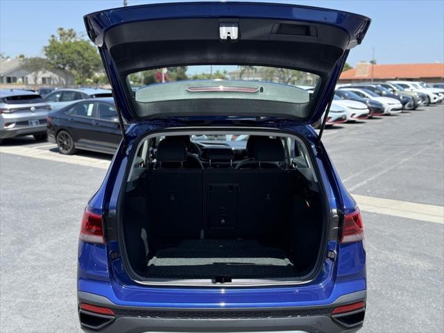 Photo of 2023 Dusk Blue Metallic Volkswagen Taos