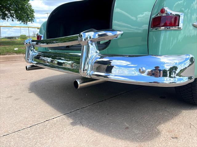 Photo of 1950 Light Green Plymouth DeLuxe