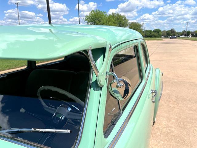 Photo of 1950 Light Green Plymouth DeLuxe