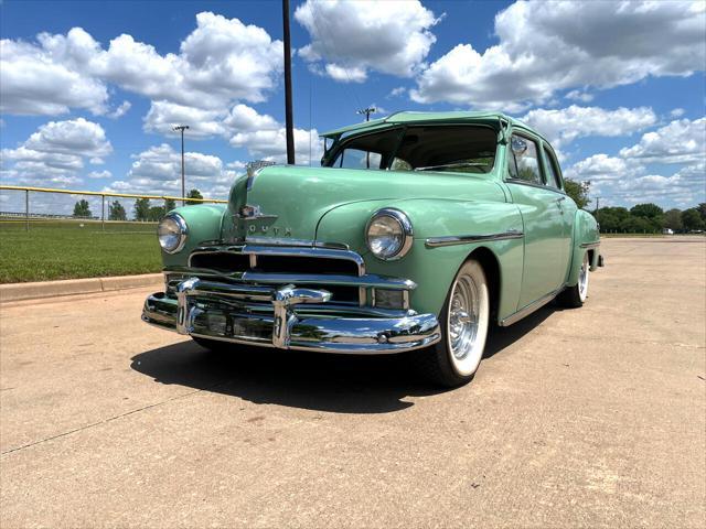 Photo of 1950 Light Green Plymouth DeLuxe