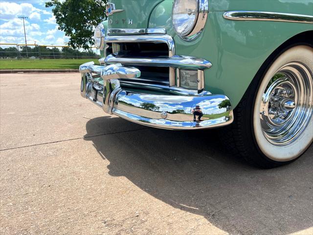 Photo of 1950 Light Green Plymouth DeLuxe
