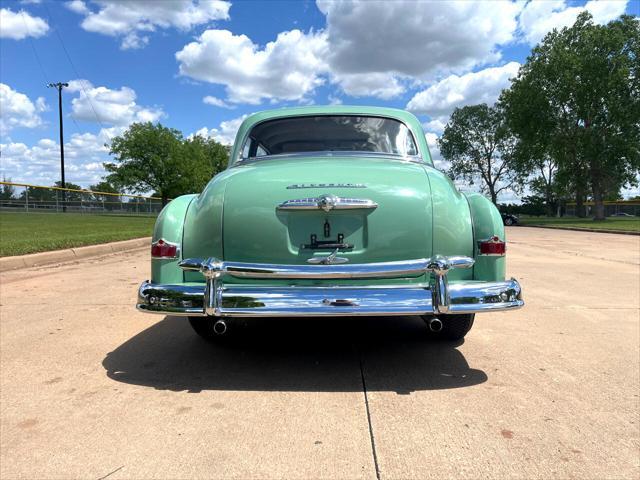 Photo of 1950 Light Green Plymouth DeLuxe