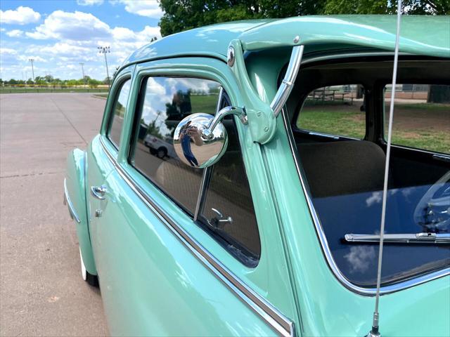 Photo of 1950 Light Green Plymouth DeLuxe