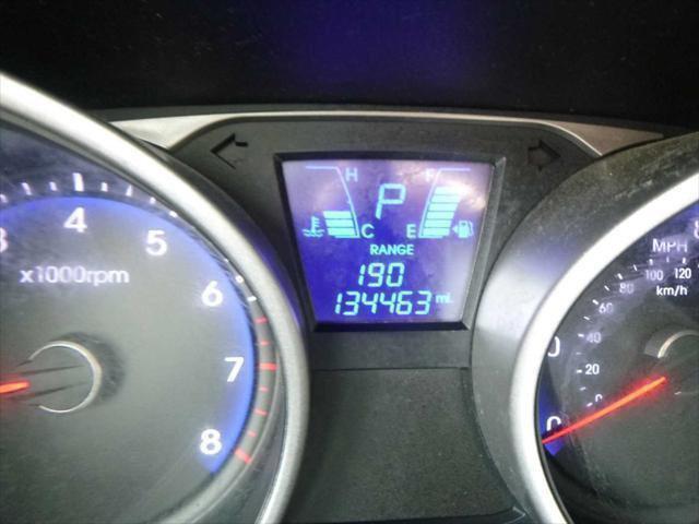 Photo of 2012 Cotton White Hyundai TUCSON