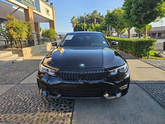 Photo of 2021 Jet Black BMW 330e