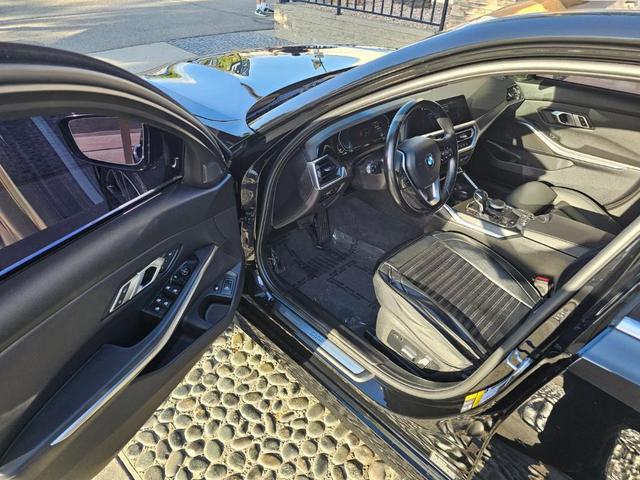 Photo of 2021 Jet Black BMW 330e