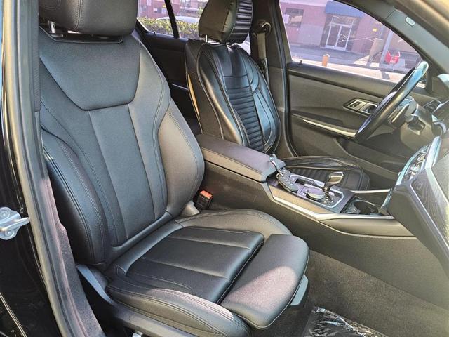 Photo of 2021 Jet Black BMW 330e