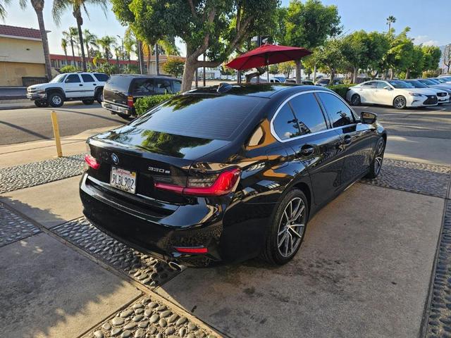 Photo of 2021 Jet Black BMW 330e