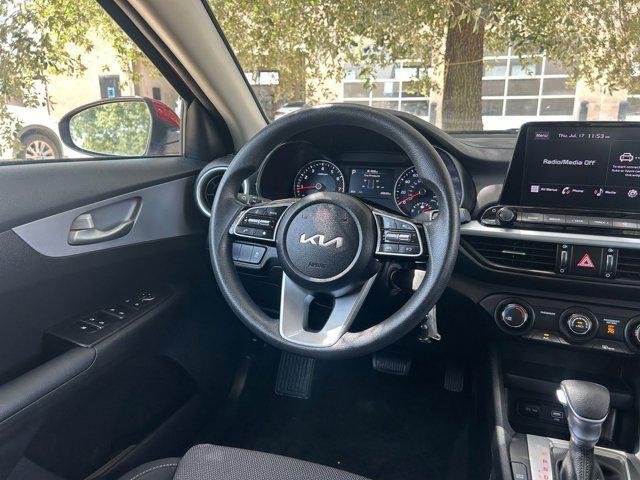 Photo of 2024 Currant Red Kia Forte