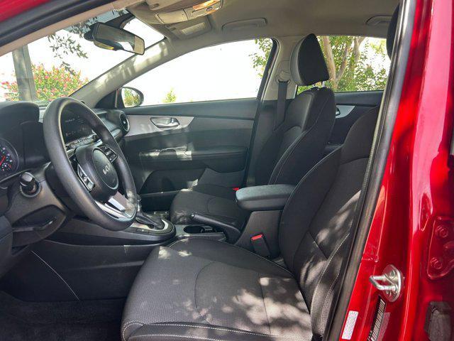 Photo of 2024 Currant Red Kia Forte