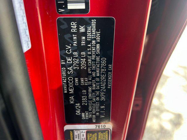 Photo of 2024 Currant Red Kia Forte