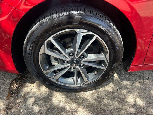 Photo of 2024 Currant Red Kia Forte