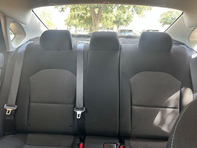 Photo of 2024 Currant Red Kia Forte
