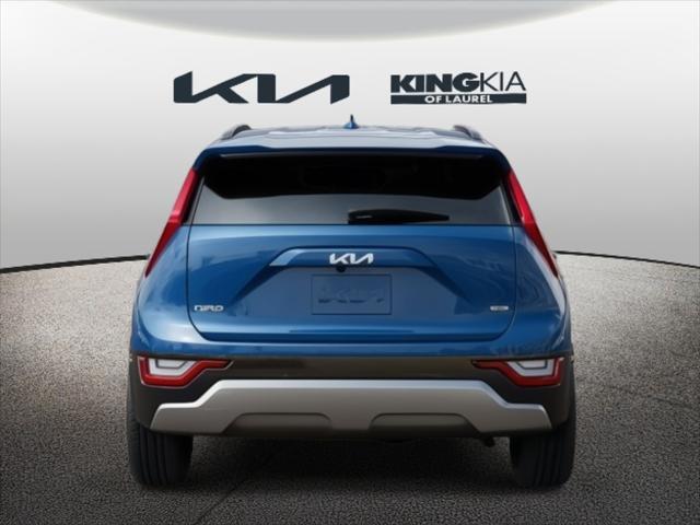 Photo of 2025 Mineral Blue Kia Niro