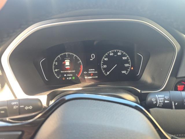 Photo of 2025 Radiant Red Metallic II Honda Pilot