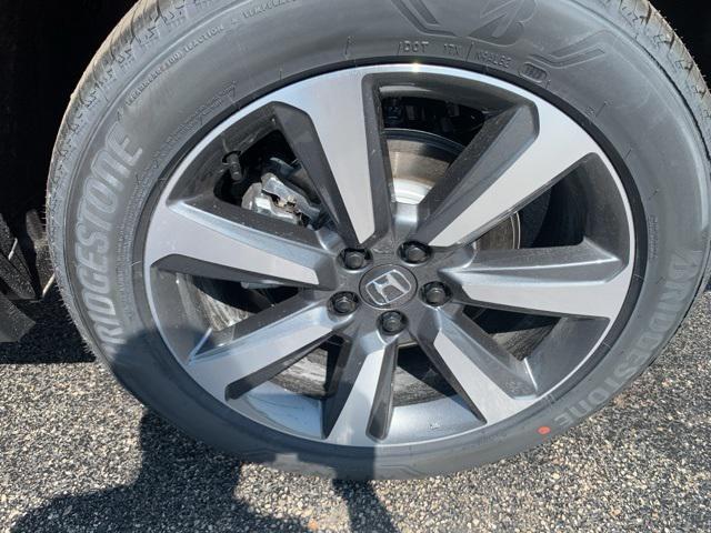 Photo of 2025 Radiant Red Metallic II Honda Pilot