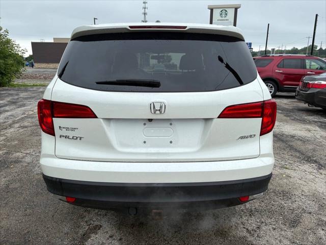 Photo of 2016 White Diamond Pearl Honda Pilot