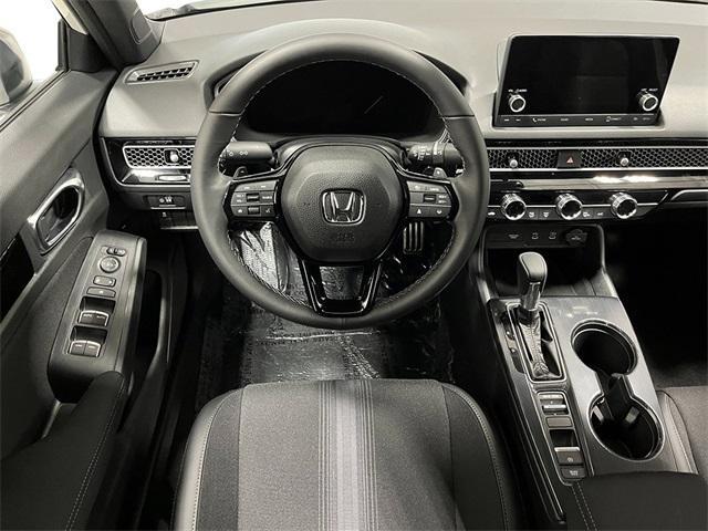Photo of 2026 Urban Gray Pearl Honda Civic Hybrid