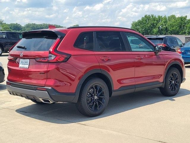 Photo of 2026 Radiant Red Metallic Honda CR-V Hybrid