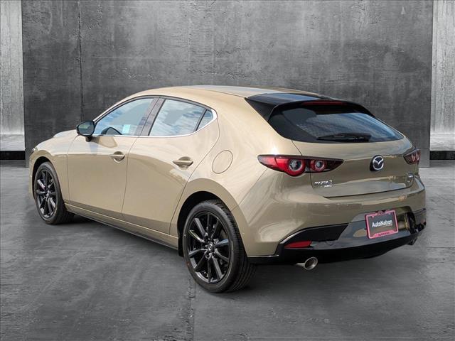 Photo of 2025 Zircon Sand Metallic Mazda Mazda3