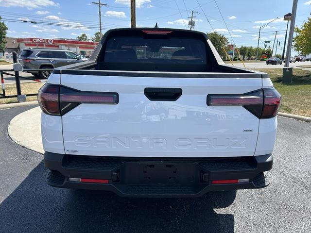 Photo of 2025 Atlas White Hyundai SANTA CRUZ