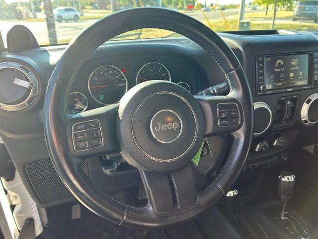Photo of 2013 Bright White Clearcoat Jeep Wrangler Unlimited